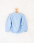 Light blue sweater with Tintin and Milo | 5-6 years