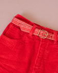 מכנסיים מקורדרוי אדום עם חגורה משובצת מהסבנטיז | 7-8 שנים