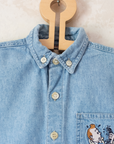 Tintin embroidered button-up denim shirt | 6-7 years
