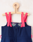 Blue dress with pink straps and floral pockets | Belgian dead stock from the 70s | 7-8 years