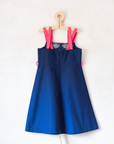 Blue dress with pink straps and floral pockets | Belgian dead stock from the 70s | 7-8 years