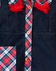 Corduroy dress with checks and pompoms | 3-4 years