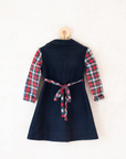 Corduroy dress with checks and pompoms | 3-4 years