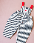 Striped overalls with red pom-pom from Yves Saint Laurent | 12-18 months