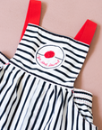 Striped overalls with red pom-pom from Yves Saint Laurent | 12-18 months