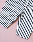 Striped overalls with red pom-pom from Yves Saint Laurent | 12-18 months