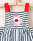 Striped overalls with red pom-pom from Yves Saint Laurent | 12-18 months