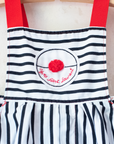 Striped overalls with red pom-pom from Yves Saint Laurent | 12-18 months