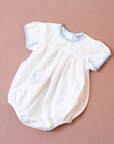 White overalls with train embroidery, birds and sun | 3-6 months