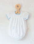 White overalls with train embroidery, birds and sun | 3-6 months