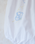 White overalls with train embroidery, birds and sun | 3-6 months