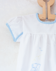 White overalls with train embroidery, birds and sun | 3-6 months