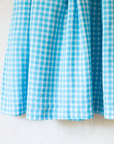 Light blue Spanish dress with checks and flowers | 4-5 years