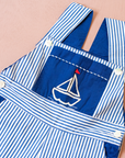 Overalls with blue stripes and an embroidered sailboat | 18-24 months