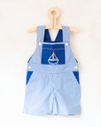 Overalls with blue stripes and an embroidered sailboat | 18-24 months
