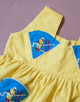 טוניקה צהובה משנות ה50 עם כבאי אש | 6-9 חודשים