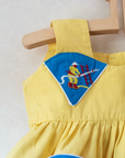 טוניקה צהובה משנות ה50 עם כבאי אש | 6-9 חודשים
