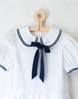 White sailor dress with collar and bow tie | 9-10 years