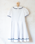White sailor dress with collar and bow tie | 9-10 years