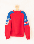 סוודר צמר אדום וכחול עם כלב ים | 5-6 שנים