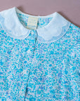 חולצה וחצאית פרחוניות בגווני תכלת | 10-11 שנים
