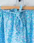 חולצה וחצאית פרחוניות בגווני תכלת | 10-11 שנים