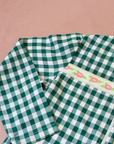 Green and white checkered shirt with flowers | 7-8 years