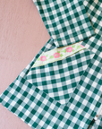 Green and white checkered shirt with flowers | 7-8 years