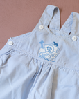 Striped overalls and a box of comfort from Yves Saint Laurent | 9-12 months