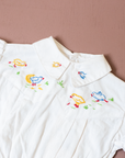 White shirt with embroidered ducks and gathered waist | 3-6 months