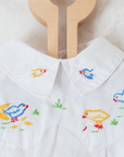 White shirt with embroidered ducks and gathered waist | 3-6 months