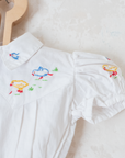 White shirt with embroidered ducks and gathered waist | 3-6 months