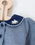 Long Pepita dress with embroidered chickens on the collar | 12-18 months