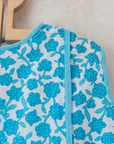 Sixties floral tunic in turquoise and white | 7-8 years
