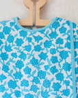 Sixties floral tunic in turquoise and white | 7-8 years