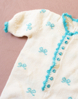 White knitted overalls with bow ties | 6-9 months