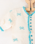 White knitted overalls with bow ties | 6-9 months