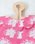 Pink shirt with bunnies and flower bouquets | 9-12 months