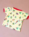 טישירט צהובה מבד מגבת עם הדפסי קיץ | 18-24 חודשים