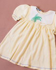 Yellow knitted dress with palm tree collar | 9-12 months