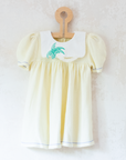 Yellow knitted dress with palm tree collar | 9-12 months
