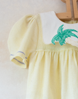 Yellow knitted dress with palm tree collar | 9-12 months
