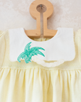 Yellow knitted dress with palm tree collar | 9-12 months