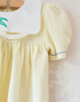 Yellow knitted dress with palm tree collar | 9-12 months