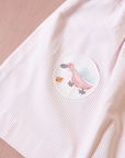 Pink and white striped dress with a goose pocket | 9-12 months