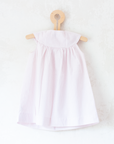 Pink and white striped dress with a goose pocket | 9-12 months