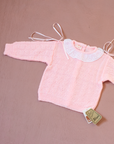 Pink knit with lace collar and bows on shoulders | Spanish deadstock | 12-18 months