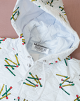 מעיל גשם לבן עם גפרורים | 7-8 שנים