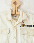 חולצת חאקי בהירה עם רקמות של טינטין | 18-24 חודשים