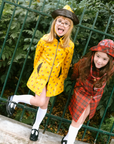 מעיל גשם צהוב עם כובע והדפס נוצות | 7-8 שנים
